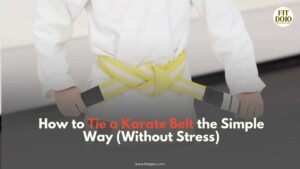 Close-up image of hands tying the knot to show How To Tie A Karate Belt simply and clearly.