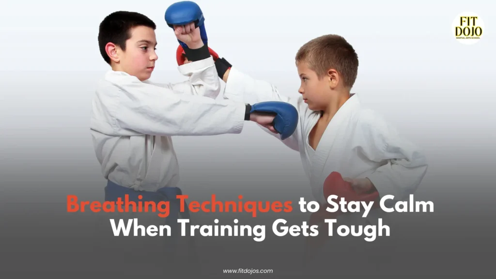 Kids learning breathing techniques during martial arts training